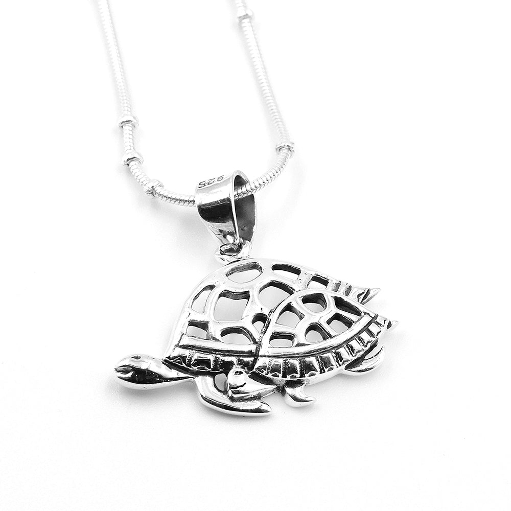 Silver tortoise pendant hotsell