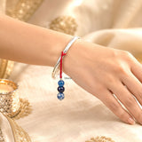 Handmade Blue Onyx Silver Lumba Rakhi with Semi-Precious Gemstones