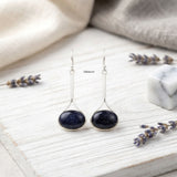 Oval blue gemstone dangler earrings with 925 silver setting