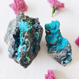 Chrysocolla rough stones in blue-green hues grouped in a set