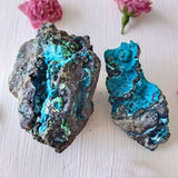 Natural Chrysocolla pieces displayed for sale by grams