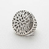 large silver statement ring intricate cutwork dome