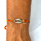 Good luck cowrie rakhi handcrafted in sterling silver
