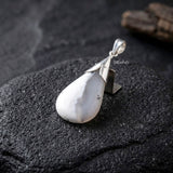 Nature-inspired Merlinite Agate pendant handcrafted in sterling silver