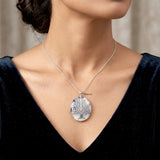Natural Merlinite Agate gemstone Tree of Life pendant close-up
