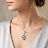Facetted Blue Chalcedony Knotted Silver Pendant