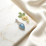 Facetted Blue Chalcedony Knotted Silver Pendant