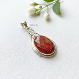 facetted golden sunstone sterling silver pendant