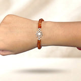 Orange Onyx beads with 925 silver flower symbol