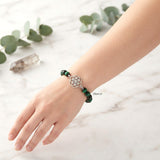 Green Tiger’s Eye stretch bracelet with silver Seed of Life charm