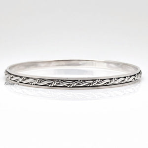 Knotted Silver Spinner Bangle