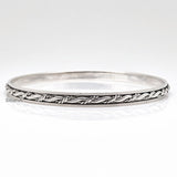 Knotted Silver Spinner Bangle