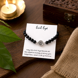 Natural ebony wood bracelet featuring a sterling silver Evil Eye symbol for everyday wear