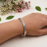 Rotating silver Kada