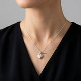 Heart shaped silver pendant with LOVE design in 925 sterling silver