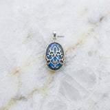 Handcrafted Labradorite silver pendant featuring intricate filigree detailing