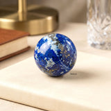 Blue Lapis Lazuli crystal sphere with natural mineral patterns
