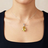 elongated yellow gemstone silver pendant