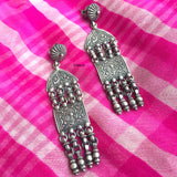 Long handcrafted silver earrings for festive and ethnic styling