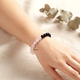 Natural gemstone bracelet featuring Rose Quartz and Black Obsidian crystals