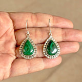 Close up of natural Malachite stone set in 92.5 sterling silver earrings