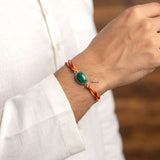 Silver Rakhi with Natural Oval Malachite Stone for Brother