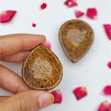 calligraphy stone diya with natural earthy patterns