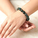 Natural Moss Agate beaded bracelet featuring unique green inclusions