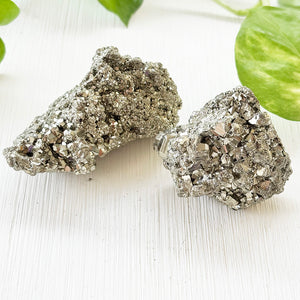 Close-up of raw pyrite crystal showing sparkling cube formations