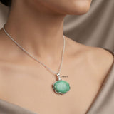 Elegant oval Tibetan Turquoise pendant in genuine 925 silver