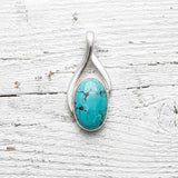 Handcrafted 925 silver pendant featuring a natural Turquoise gemstone