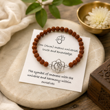 Natural Rudraksha stretch bracelet featuring a 925 sterling silver Om symbol