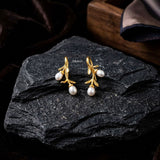 gold plated pearl drop earrings twig design