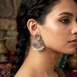 Ethnic sterling silver earrings with elegant pearl detailing