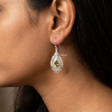 minimal silver drop earrings with natural peridot