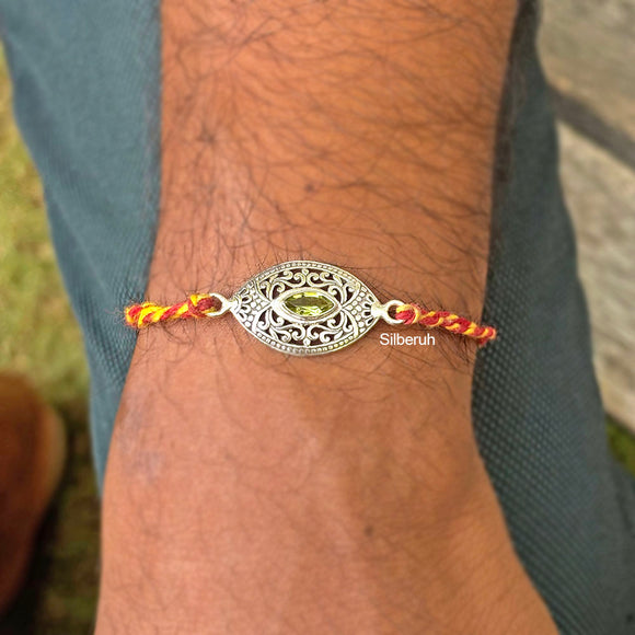 Peridot Purre Silver Rakhi