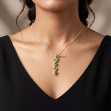 Elegant Peridot gemstone snake pendant for women