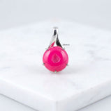 Sparkling pink druzy silver pendant with classic round design