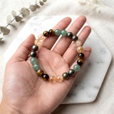Handmade prosperity crystal bracelet featuring Pyrite Citrine Green Aventurine and Tiger's Eye