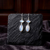Natural Rainbow Moonstone eye-inspired sterling silver earring