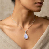 Natural Rainbow Moonstone sterling silver pendant close-up view