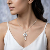 Crescent moon sterling silver pendant with Rainbow Moonstone and Crystal Quartz