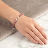 6mm Rhodonite gemstone bracelet with silver infinity symbol