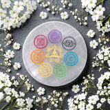 Round selenite crystal charging plate with chakra engraving