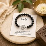 Natural Karungali bracelet featuring a genuine 925 sterling silver Evil Eye centrepiece