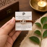 Natural Rudraksha bracelet featuring a 925 sterling silver Om symbol