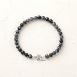 6mm Snowflake Obsidian gemstone bracelet with silver Celtic knot