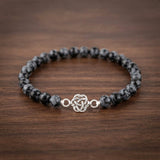 Natural Snowflake Obsidian Celtic knot bracelet in 925 silver