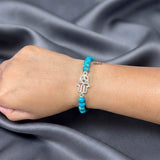 8mm turquoise gemstone bracelet with silver Hamsa