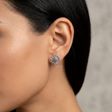 Minimal sunflower silver stud earrings in polished sterling silver